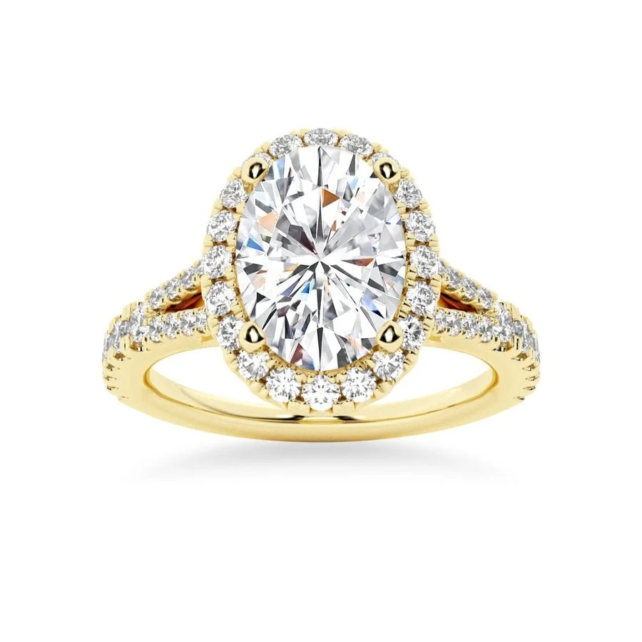 Yellow gold oval moissanite engagement ring top view with sparkling halo and pave split shank-Novelle Vow