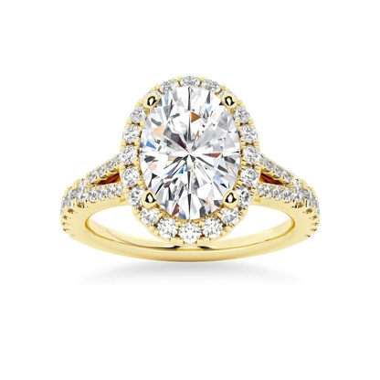 Yellow gold oval moissanite engagement ring top view with sparkling halo and pave split shank-Novelle Vow