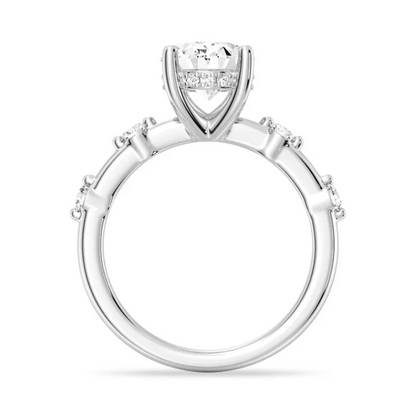 White gold oval moissanite engagement ring direct side profile view with hidden halo and spaced diamond band