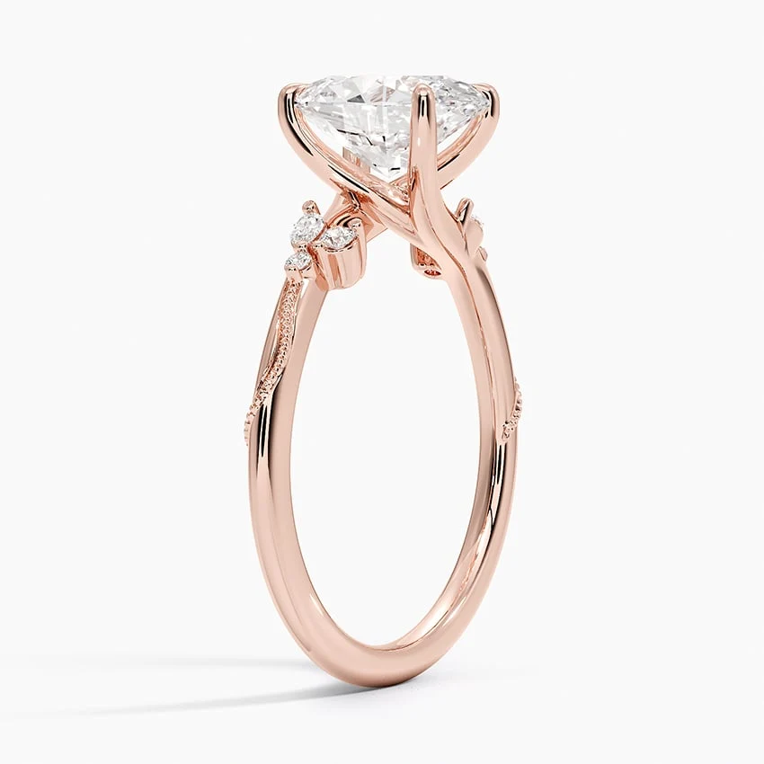 Rose gold oval moissanite ring 3/4 side angle displaying vine accents