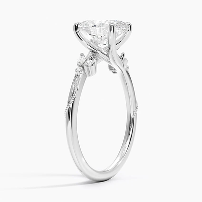 White gold oval moissanite ring 3/4 side angle displaying vine accents