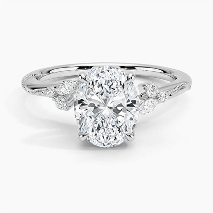 NOVELLE VOW white gold oval moissanite engagement ring top view with floral leaf side stones