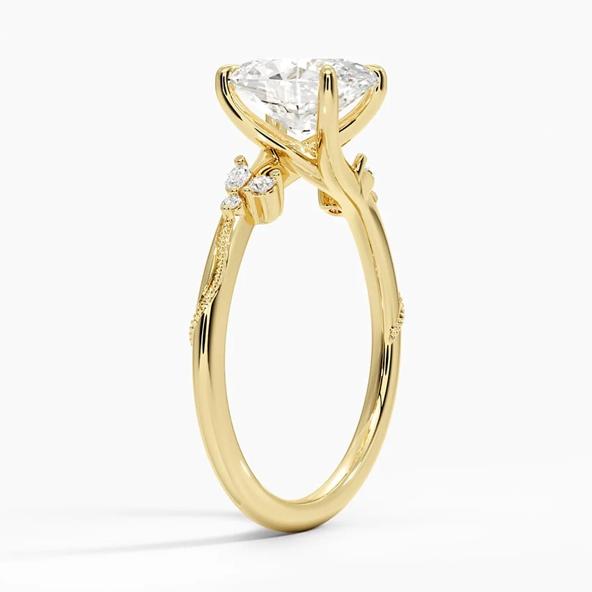 Yellow gold oval moissanite ring 3/4 side angle displaying vine accents