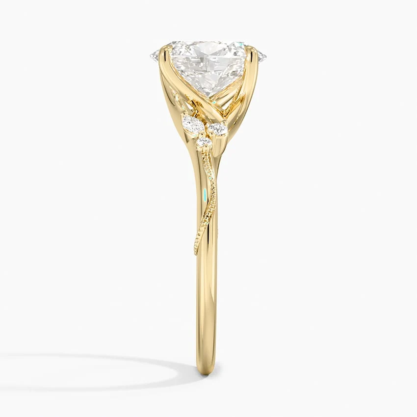 Yellow gold nature inspired oval moissanite engagement ring 3/4 perspective view