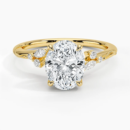 Yellow gold oval moissanite engagement ring stacked with matching round and marquise wedding band