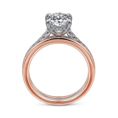 Two-tone rose gold oval moissanite engagement ring direct side profile displaying white gold setting