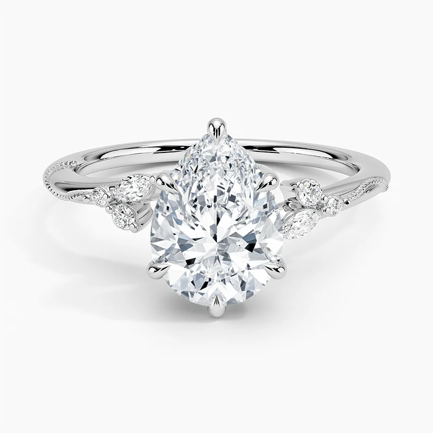 White gold pear-cut moissanite engagement ring top view displaying delicate marquise side gems-NOVELLE-VOW