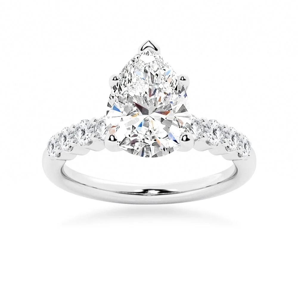White gold pear-cut moissanite engagement ring top view with sparkling shared-prong side stones-NOVELLE VOW