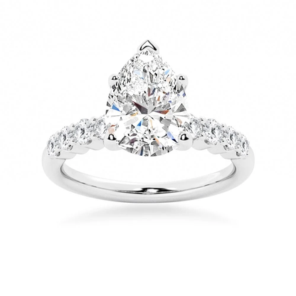 White gold pear-cut moissanite engagement ring top view with sparkling shared-prong side stones-NOVELLE VOW