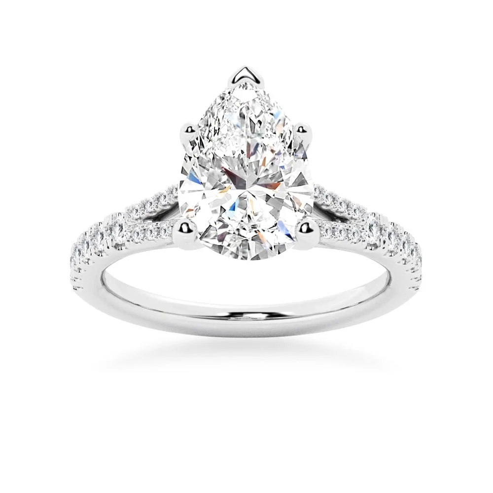 White gold pear-cut moissanite engagement ring top view showcasing split-shank pave band-NOVELLE VOW
