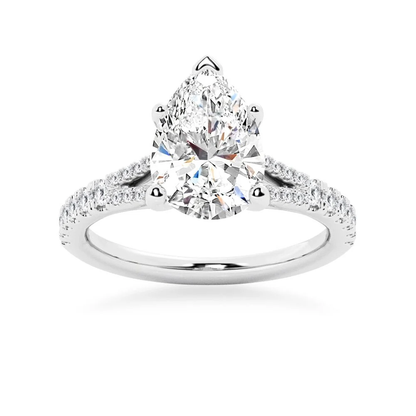 White gold pear-cut moissanite engagement ring top view showcasing split-shank pave band-NOVELLE VOW