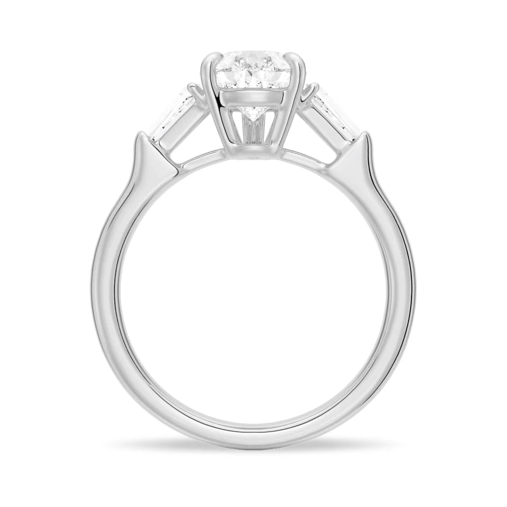 White gold pear moissanite engagement ring direct side profile view showing open basket