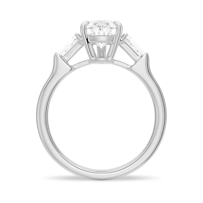 White gold pear moissanite engagement ring direct side profile view showing open basket