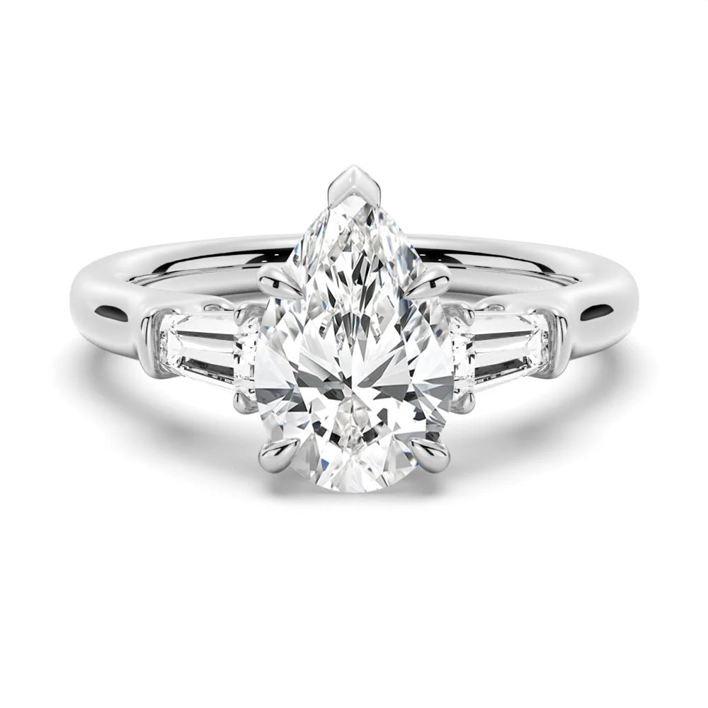 White gold pear moissanite engagement ring top view with double-claw prongs and tapered baguette side stones-NOVELLE VOW