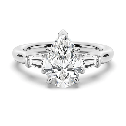 White gold pear moissanite engagement ring top view with double-claw prongs and tapered baguette side stones-NOVELLE VOW