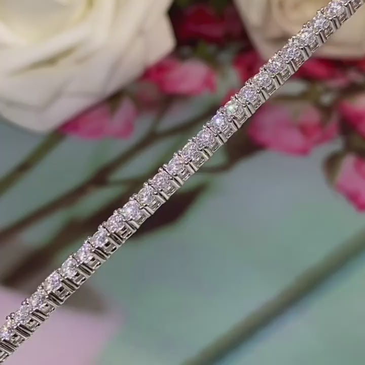 Close Up Detail of Round Cut Moissanite Tennis Bracelet Showing Sparkle and Prong Setting - Novelle Vow