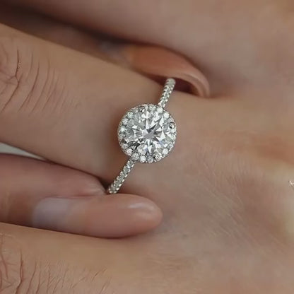 Dynamic sparkle of Radiant Round Cut Moissanite Halo Engagement Ring on hand - Novelle Vow