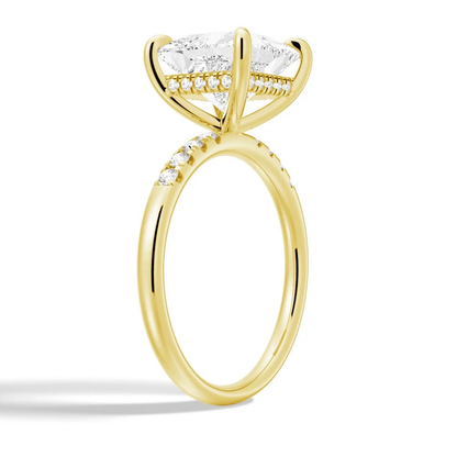 Yellow gold princess-cut moissanite engagement ring 3/4 angle view showing hidden halo setting