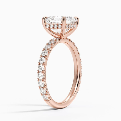 Rose gold asscher cut moissanite engagement ring 3/4 side perspective view showing claw prongs and French pave band