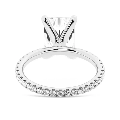 White gold 5ct radiant cut moissanite engagement ring direct side view showing basket strut prongs