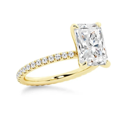 Yellow gold 5ct radiant cut moissanite engagement ring 3/4 side perspective view showing eternity pave band