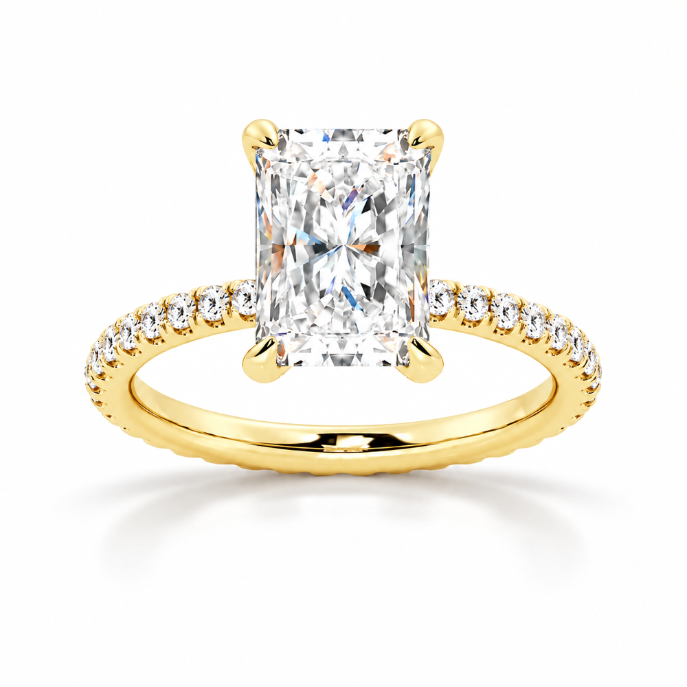 Yellow gold 5ct radiant cut moissanite engagement ring top view with micro pave diamond band