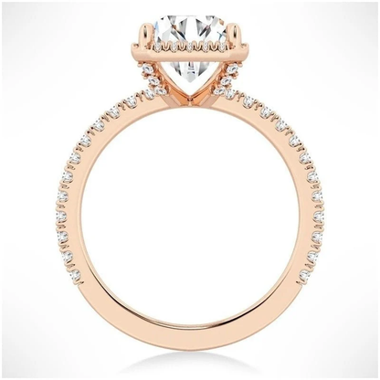 Rose gold radiant cut moissanite halo engagement ring side profile view showing pave shank