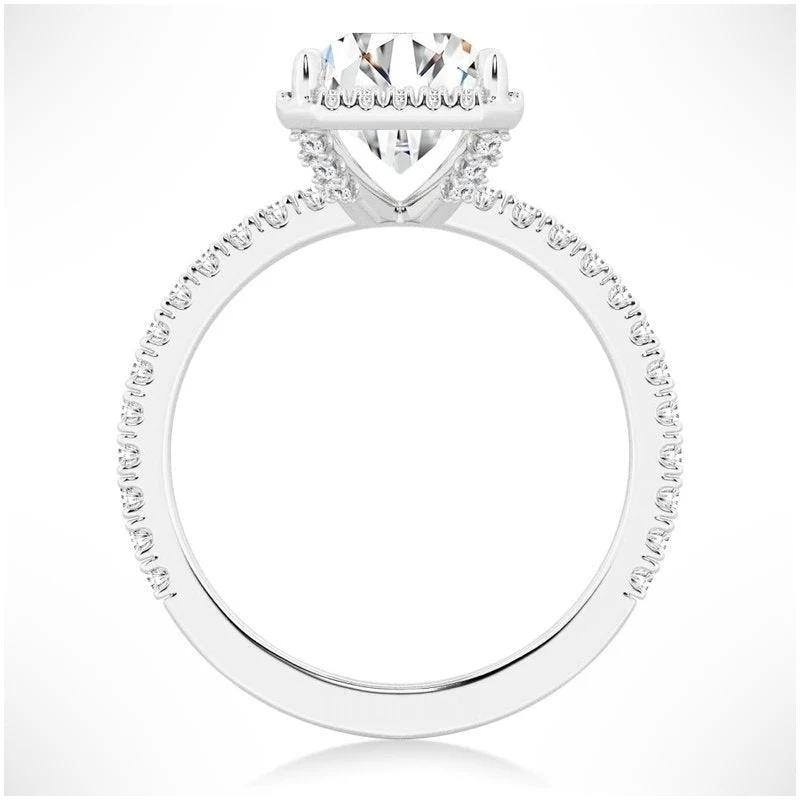 White gold radiant cut moissanite halo engagement ring side profile view showing pave shank