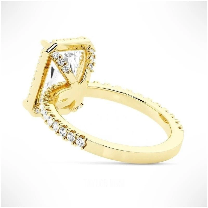 Yellow gold radiant cut moissanite halo engagement ring tilted perspective view with pave band