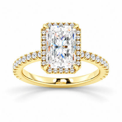 Yellow gold radiant cut moissanite halo engagement ring top view with pave diamond band