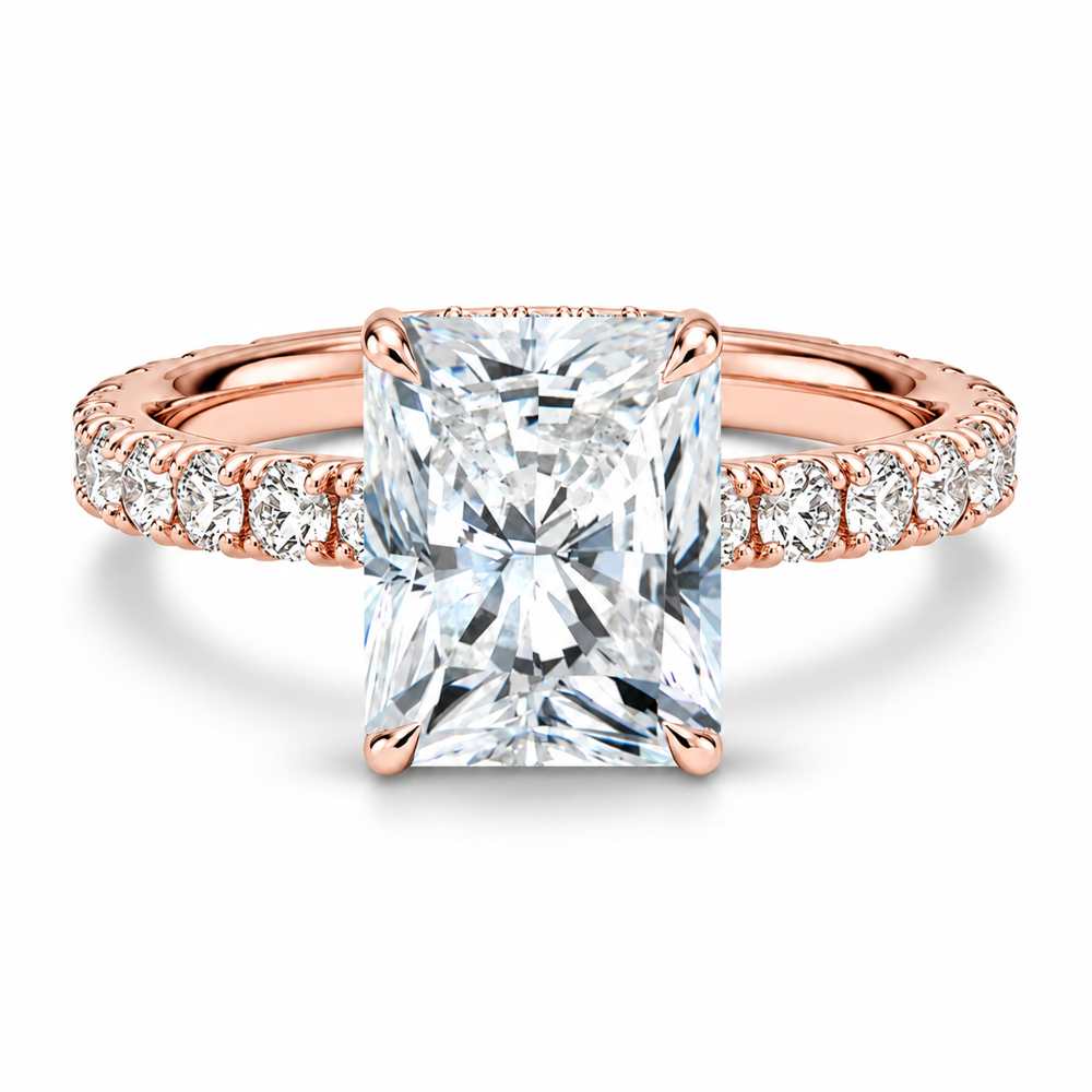 Rose gold radiant cut moissanite engagement ring top view with scalloped pave band