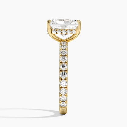 Yellow gold radiant cut moissanite engagement ring direct side profile view showing hidden halo basket