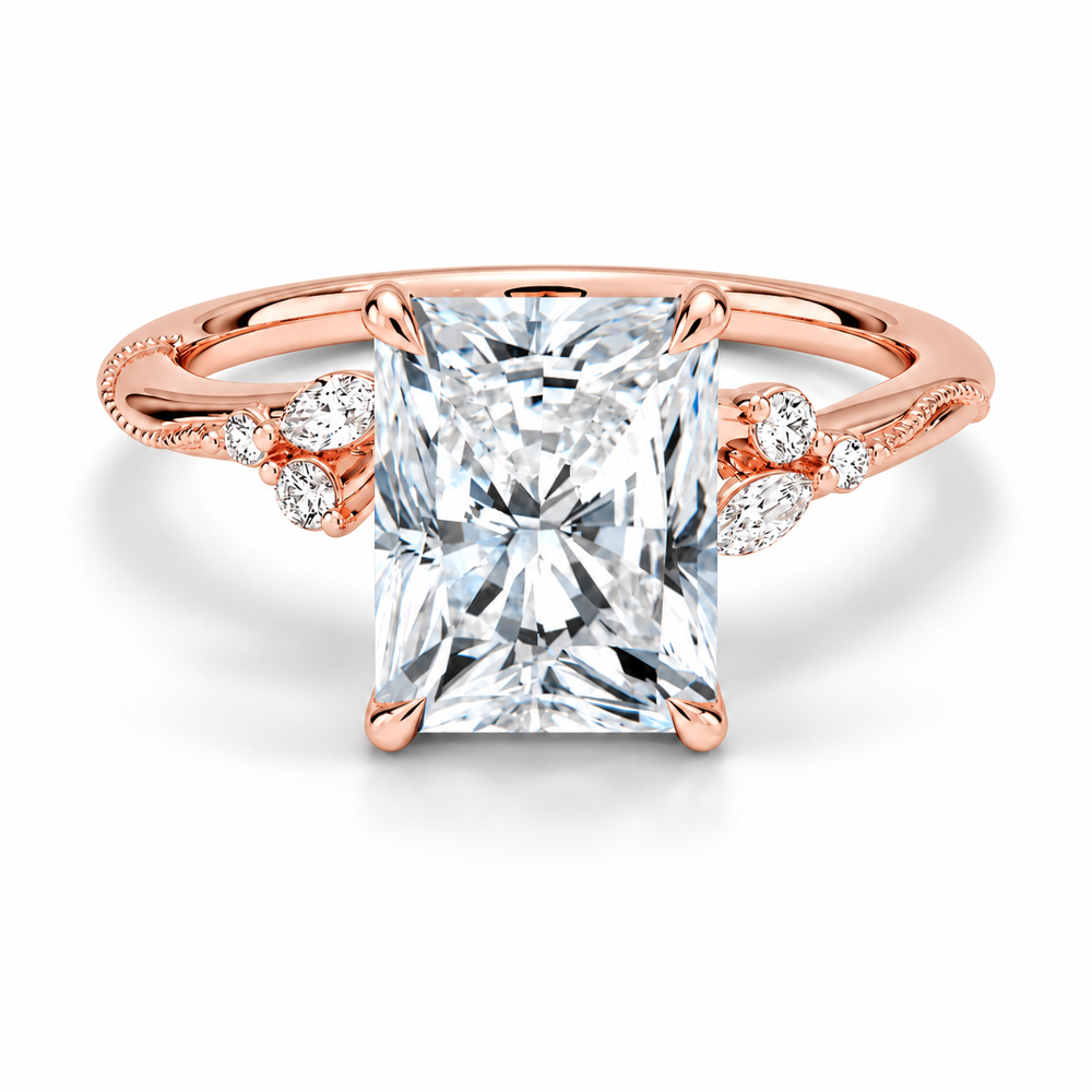 Rose gold radiant cut moissanite engagement ring top view with delicate nature inspired cluster accents