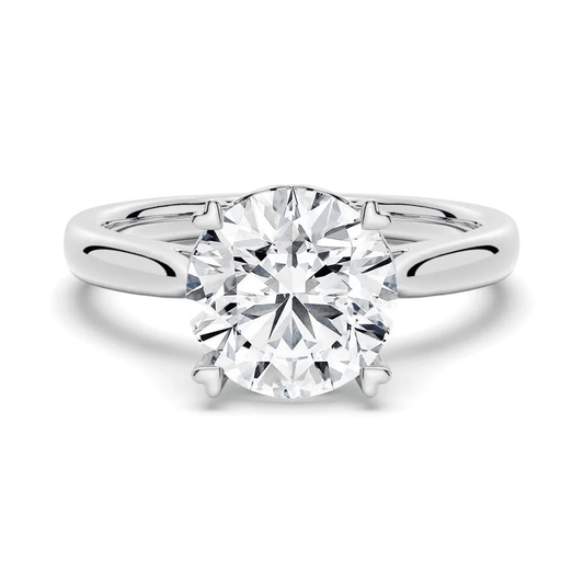Round Brilliant Cut Moissanite Engagement Ring – Heart Shaped Prongs - Novelle Vow