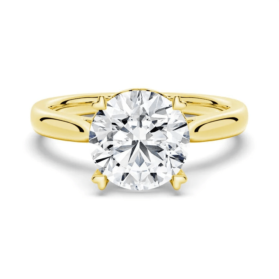 Round Brilliant Cut Moissanite Engagement Ring – Heart Shaped Prongs - Novelle Vow