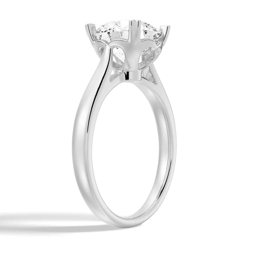 Round Brilliant Cut Moissanite Engagement Ring – Heart Shaped Prongs - Novelle Vow