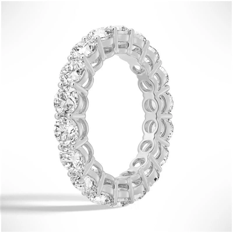 Angled profile view of Round Cut Moissanite Full Eternity Band with Shared Prong Setting in White Gold - Novelle Vow