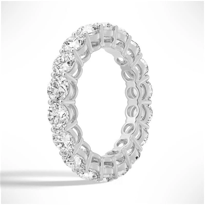 Angled profile view of Round Cut Moissanite Full Eternity Band with Shared Prong Setting in White Gold - Novelle Vow