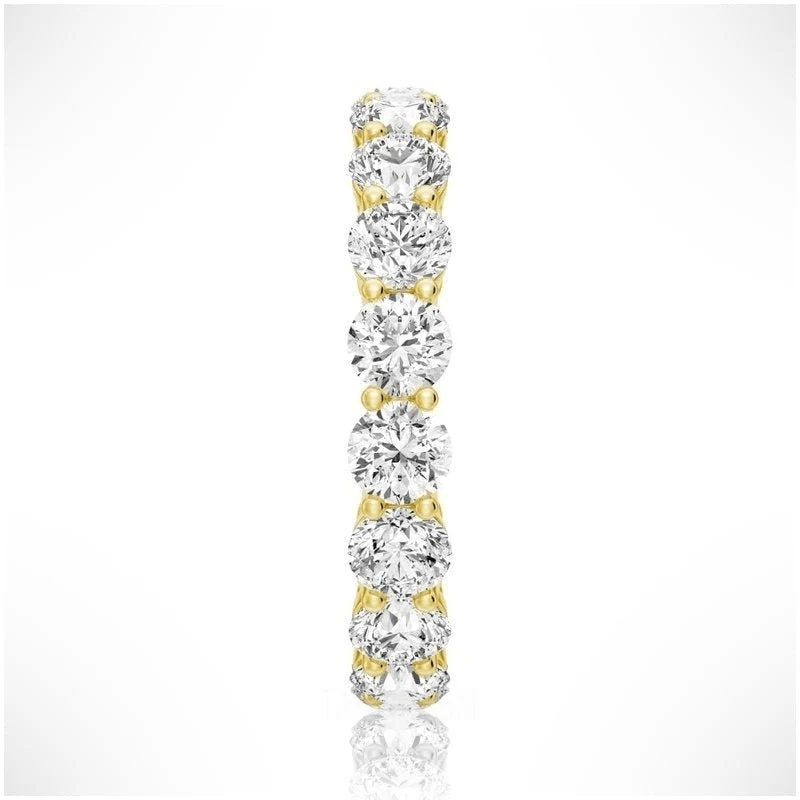Side profile view of Round Cut Moissanite Full Eternity Band with Shared Prong Setting in Yellow Gold - Novelle Vow