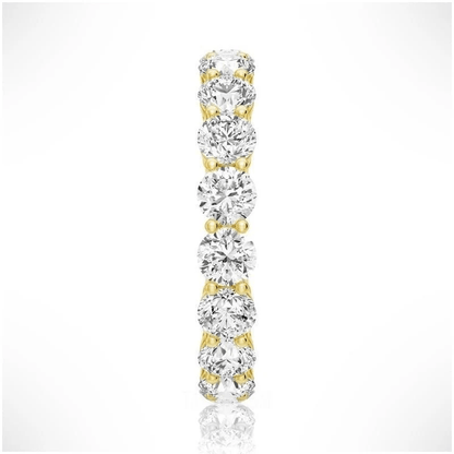 Side profile view of Round Cut Moissanite Full Eternity Band with Shared Prong Setting in Yellow Gold - Novelle Vow