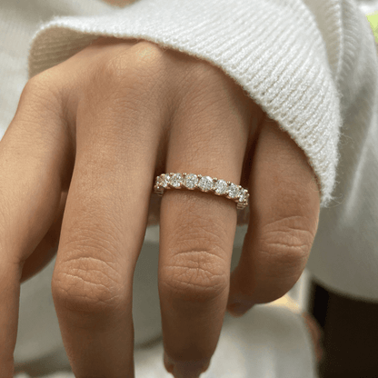 Round Cut Moissanite Full Eternity Band with Shared Prong Setting in White Gold on hand styling- Novelle Vow