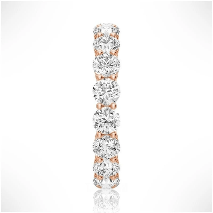 Side profile view of Round Cut Moissanite Full Eternity Band with Shared Prong Setting in Rose Gold - Novelle Vow
