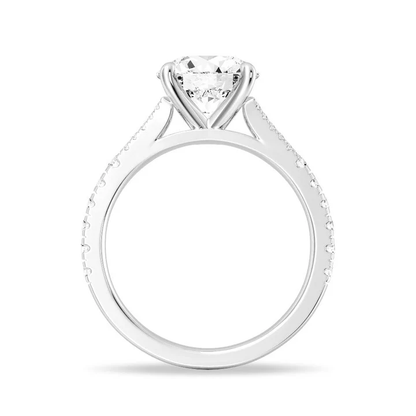 Platinum split shank round brilliant cut moissanite engagement ring with pave diamond accents