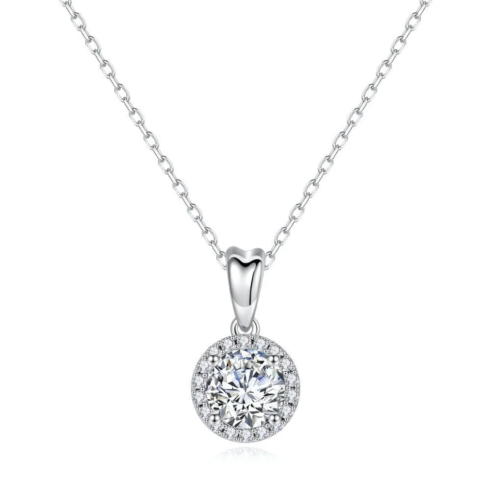 Round moissanite halo pendant necklace with pavé accents in rhodium-plated sterling silver top view-Novelle Vow