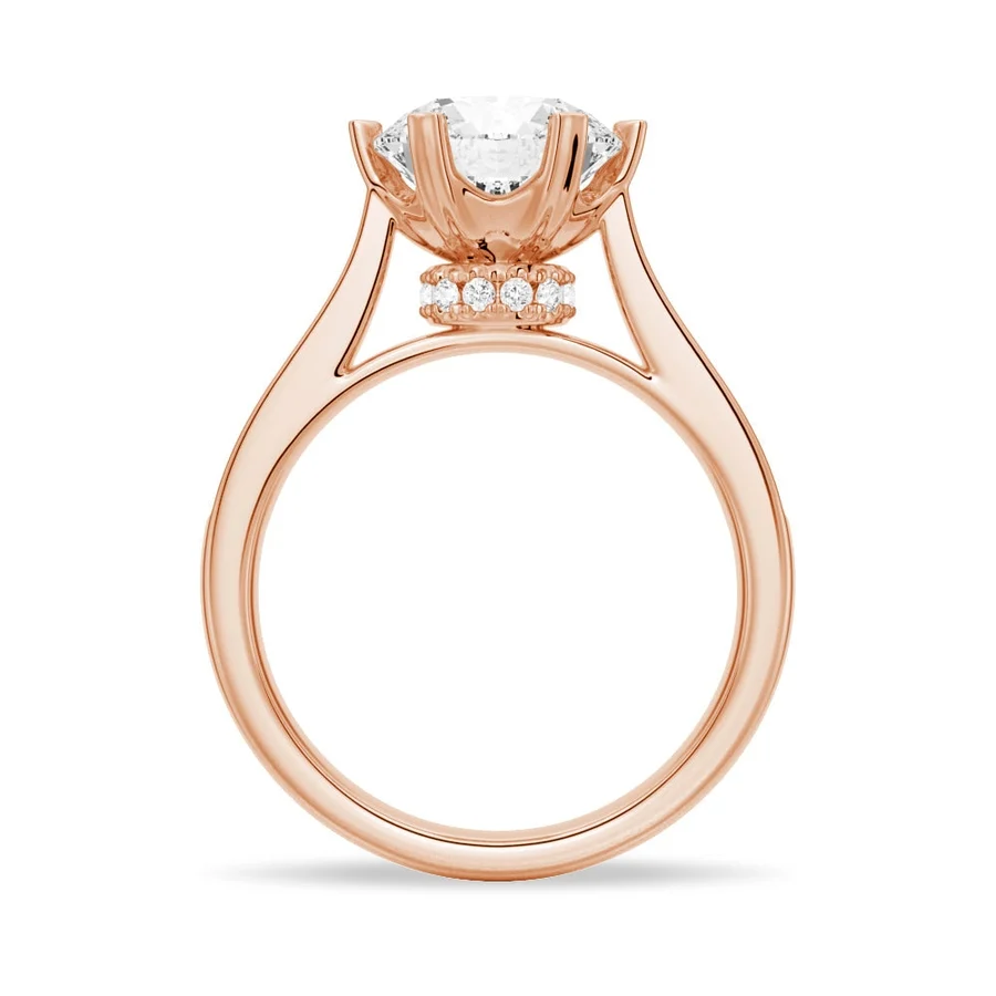 Rose gold round moissanite engagement ring direct side view showing hidden halo collar