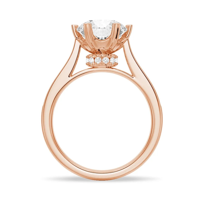 Rose gold round moissanite engagement ring direct side view showing hidden halo collar