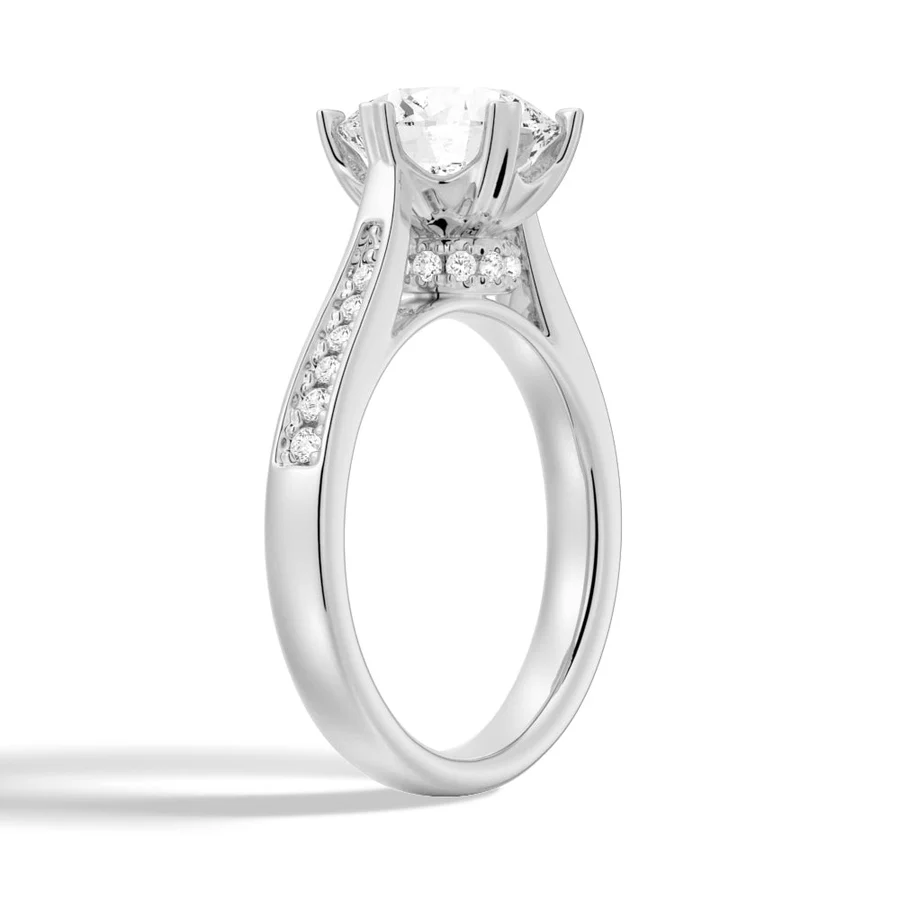 White gold round moissanite engagement ring 3/4 perspective view showing hidden collar