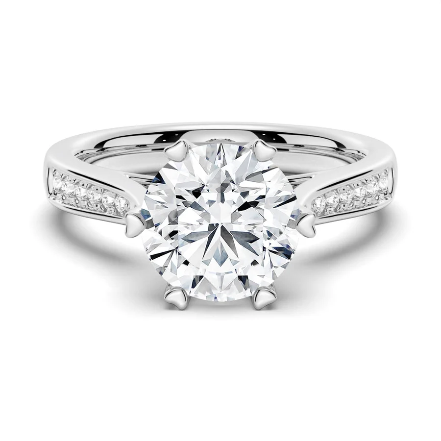 NOVELLE VOW white gold round moissanite engagement ring top view with pave side stones