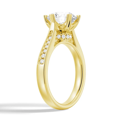 Yellow gold round moissanite engagement ring 3/4 perspective view showing hidden accent collar