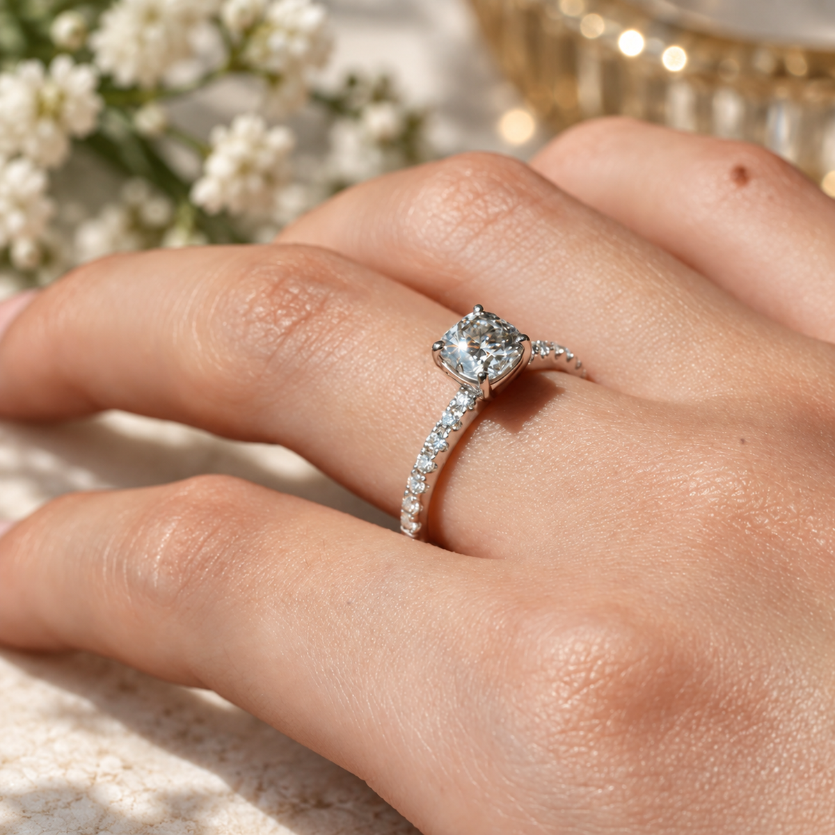 Perspective view showing hidden halo collar on rose gold moissanite engagement ring